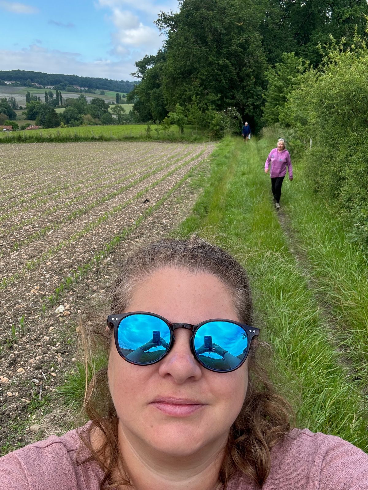 Cassie, out on a long walk through the fields