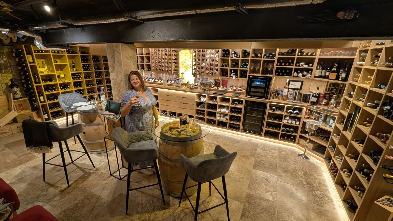 Cassie in the wine cellar at Aux 3 Sens