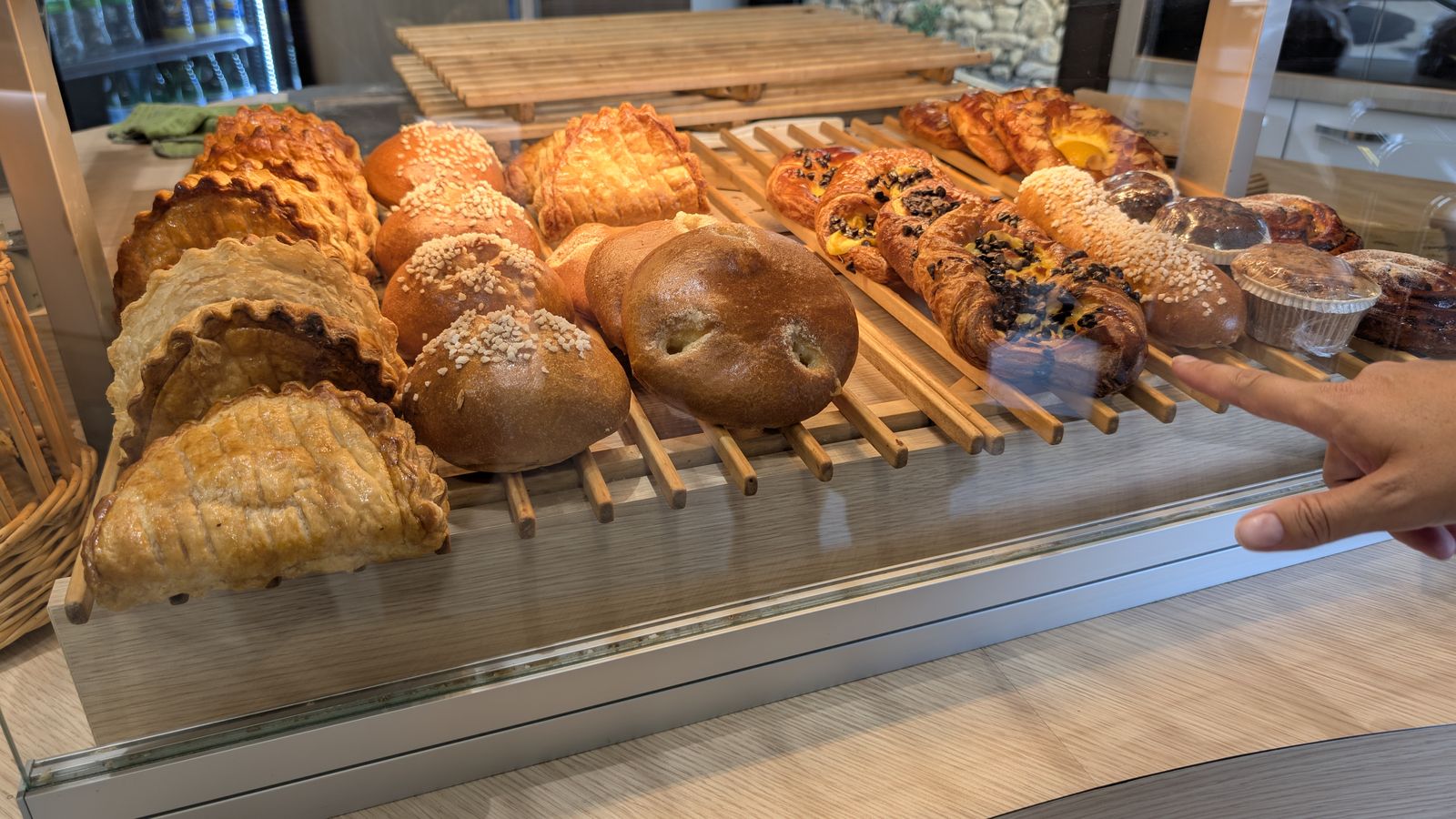 Fresh bread and pastries on a bakery counter, Castelnaud