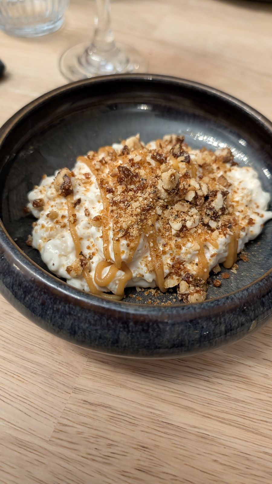 Rice pudding topped with caramel and walnut crumble, Sarlat