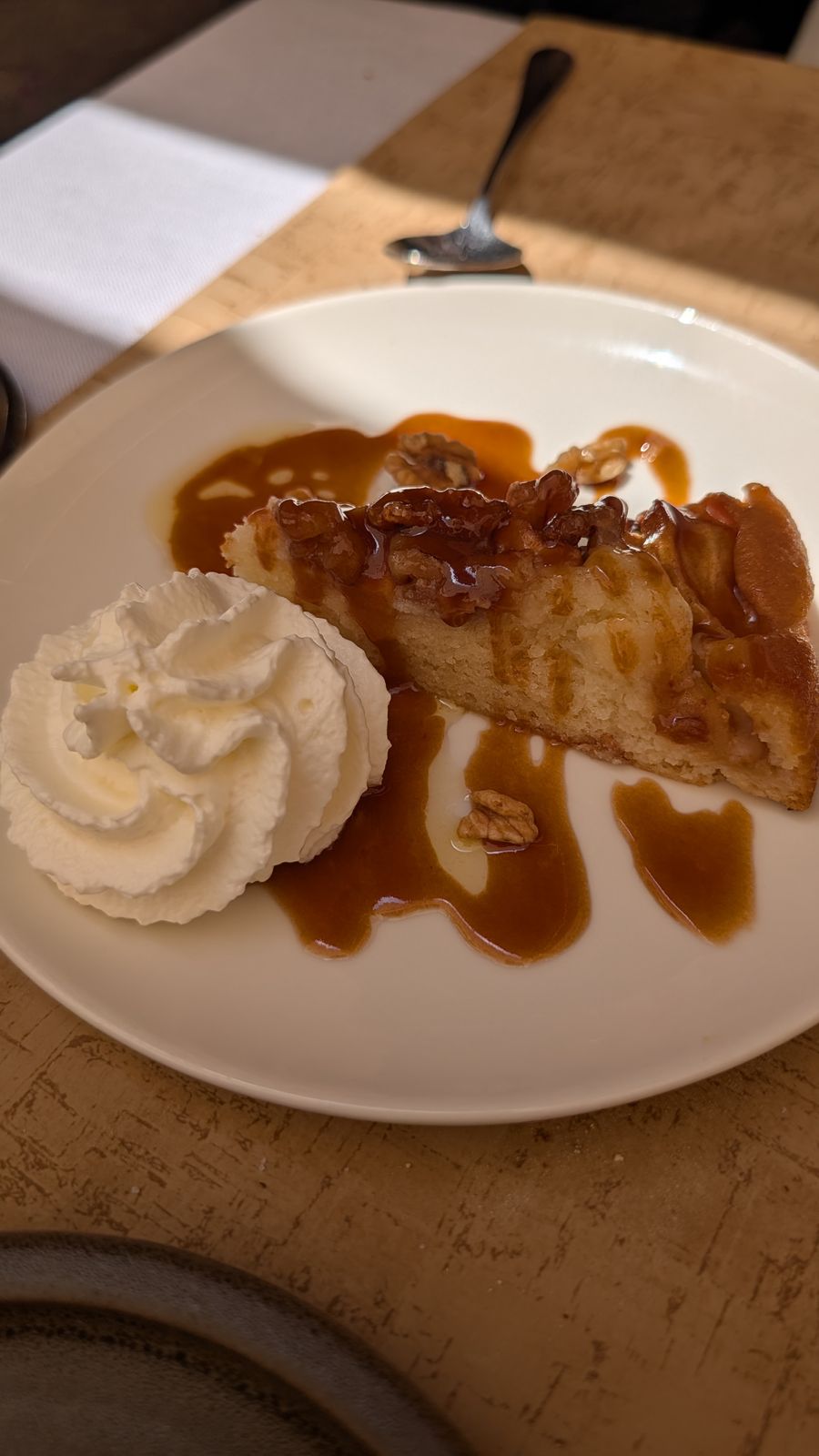A walnut tart with caramel sauce and whipped cream, Sarlat