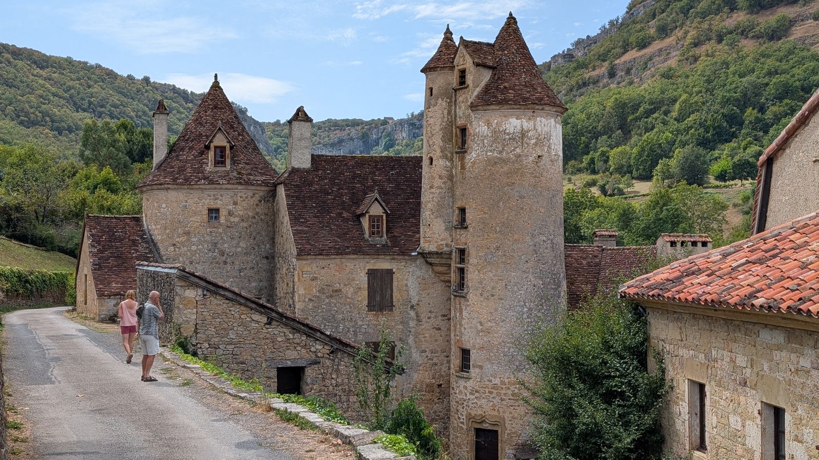 A turreted stone manor house in Autoire