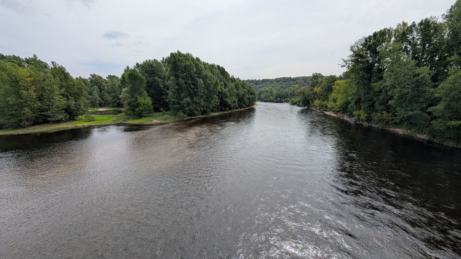 The Dordogne flowing between wooded banks at Carennac