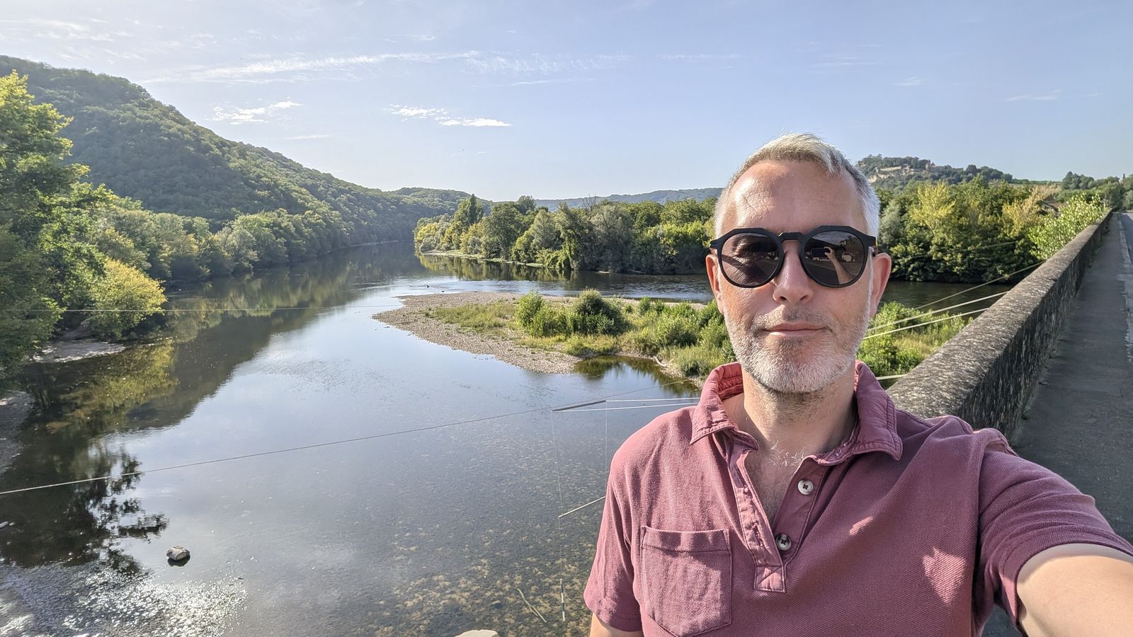 Kev taking a selfie beside the Dordogne below Castelnaud