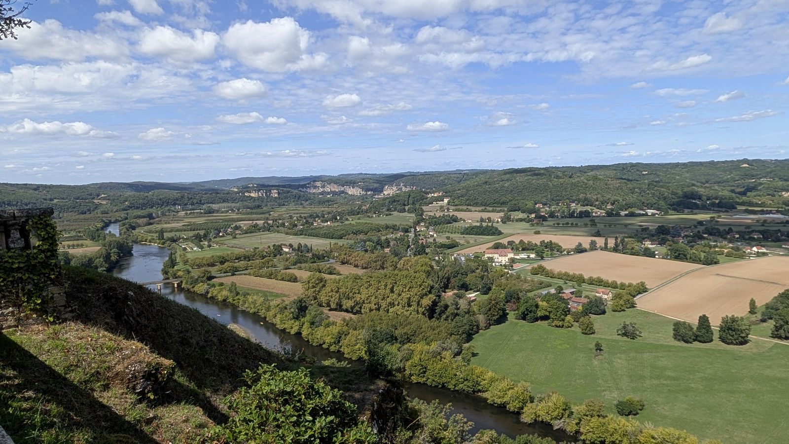 The Dordogne valley and its fields seen from the clifftop at Domme
