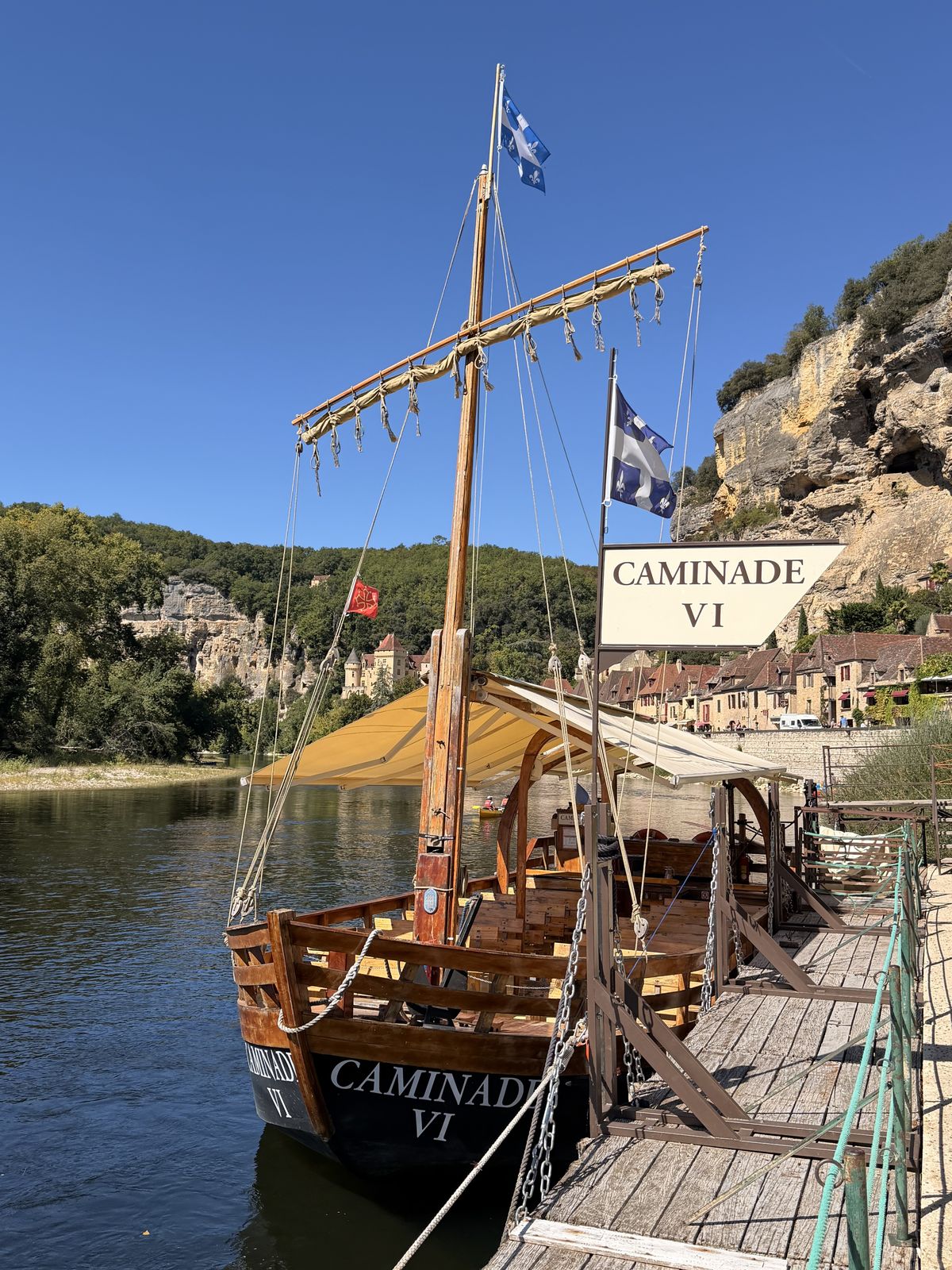 A traditional gabare boat moored at La Roque-Gageac