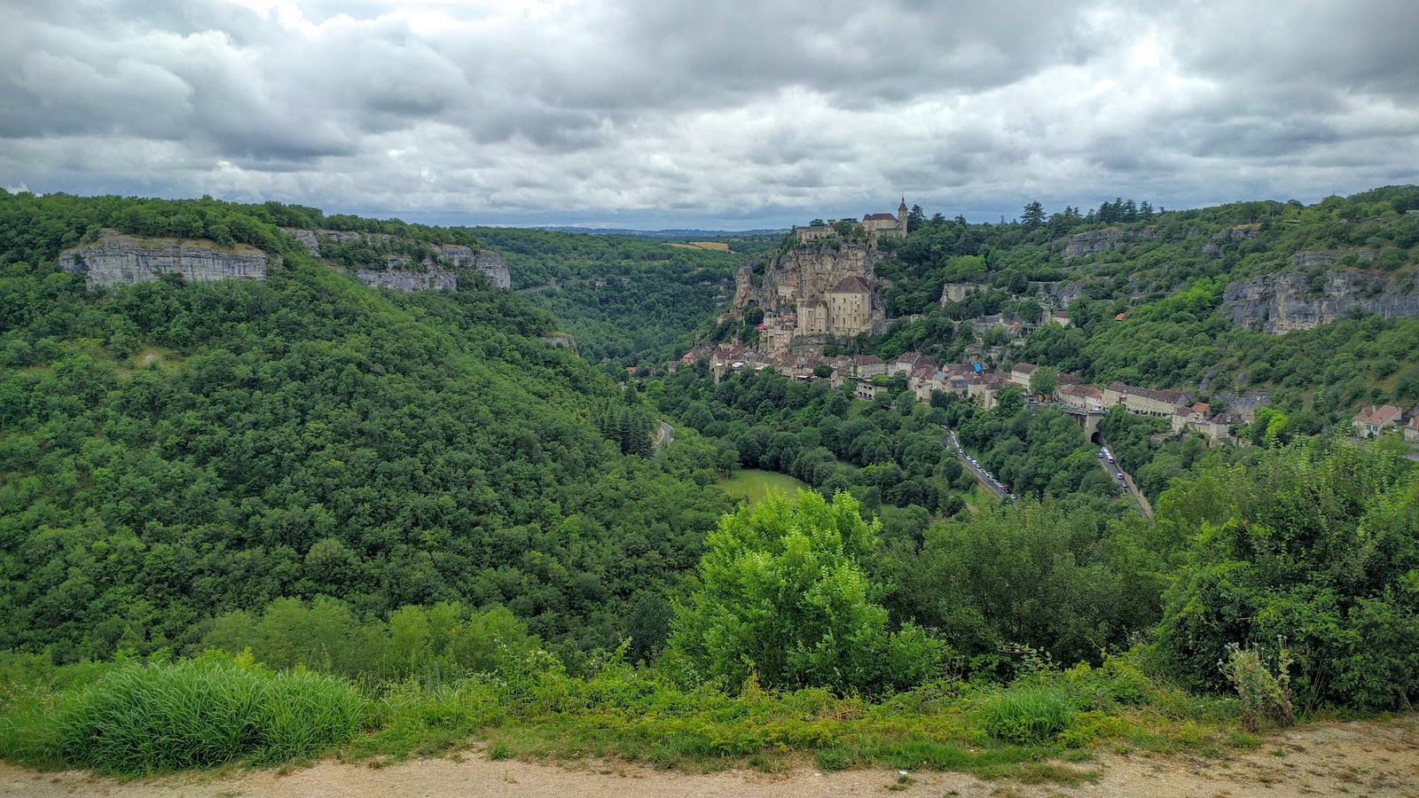 Rocamadour on its cliff, seen across the wooded valley