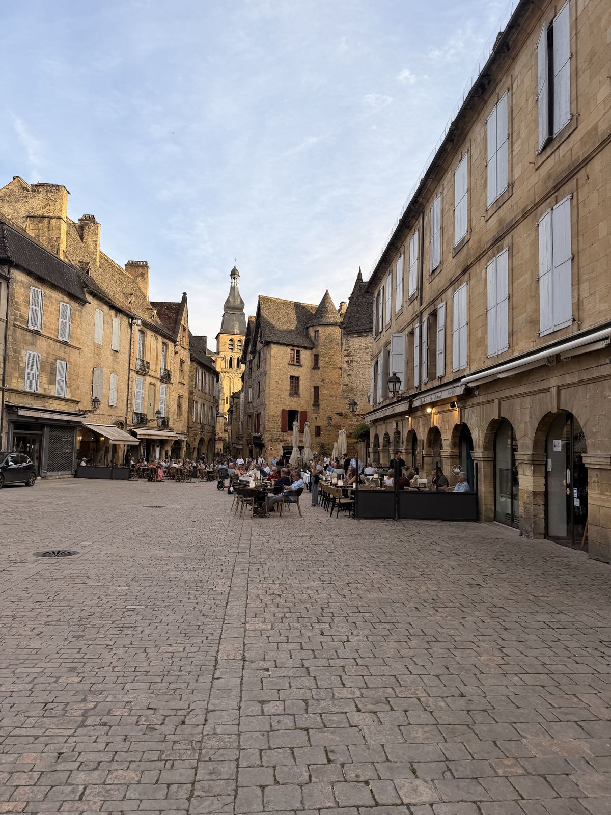 Café terraces on the Place de la Liberté in Sarlat