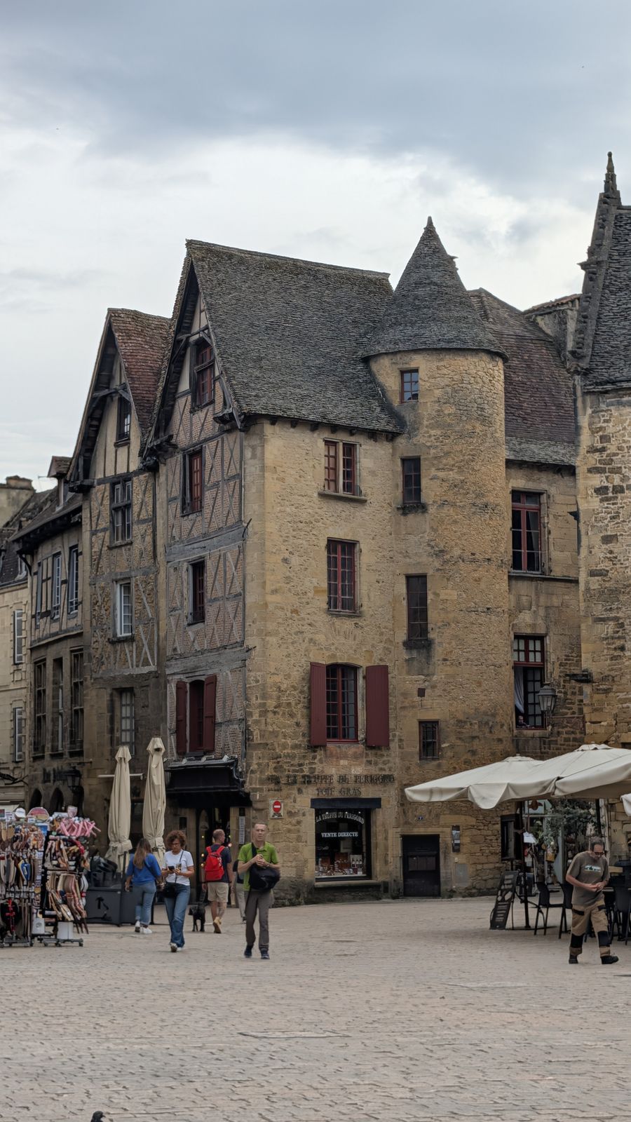 A half-timbered house with a round stone tower, Sarlat