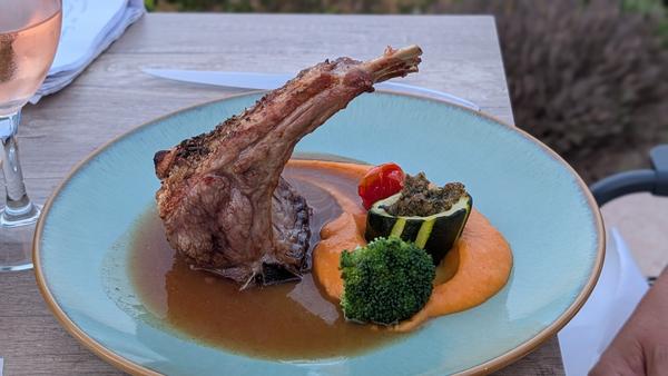 Rack of lamb with a stuffed courgette, broccoli and a red pepper sauce