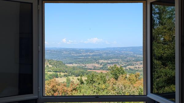 The view over the valley from a hotel window in Loubressac