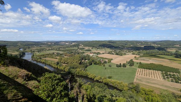 The Dordogne valley’s fields and woods seen from the clifftop at Domme