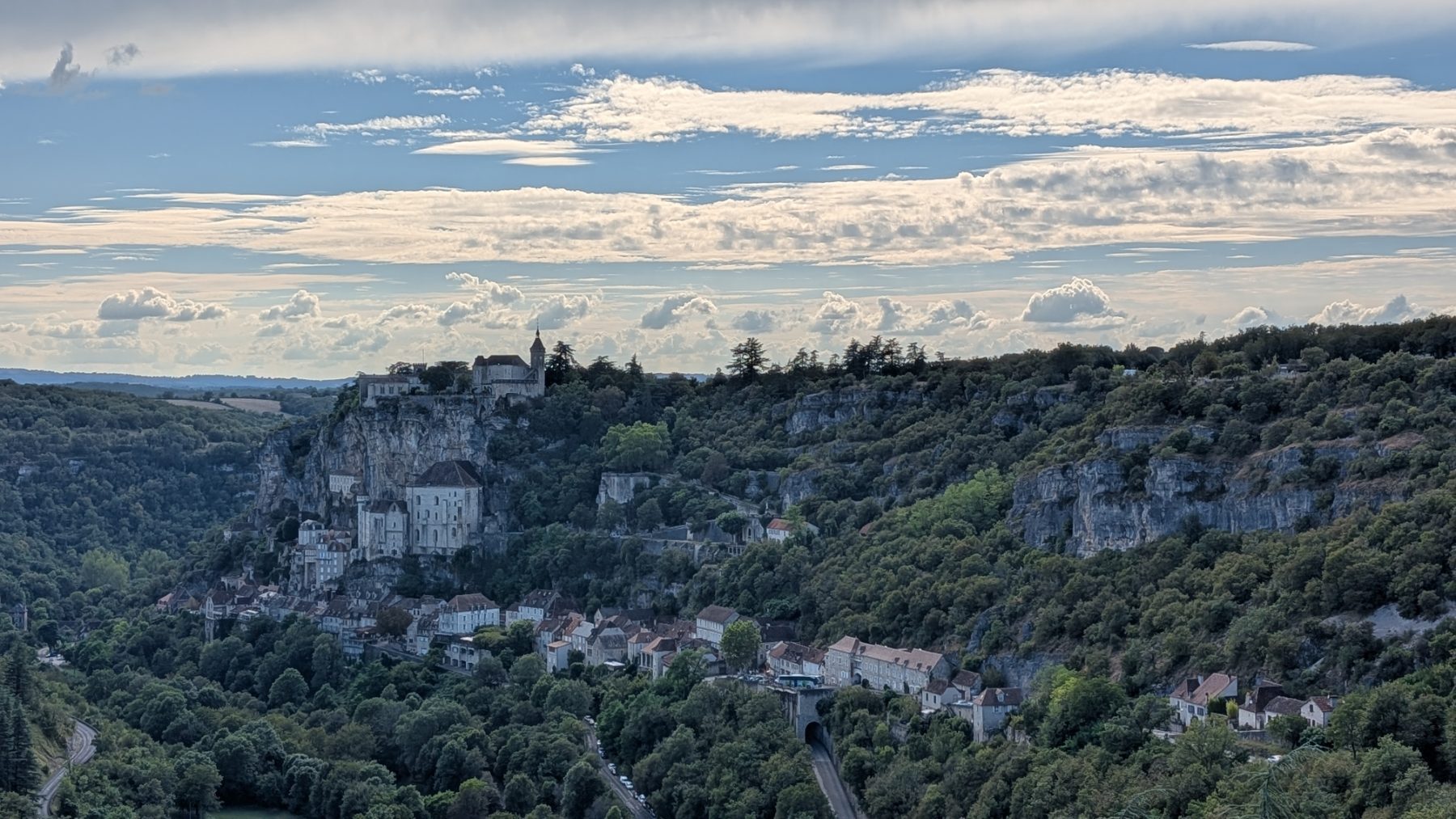 Rocamadour clinging to its limestone cliff above the Alzou gorge
