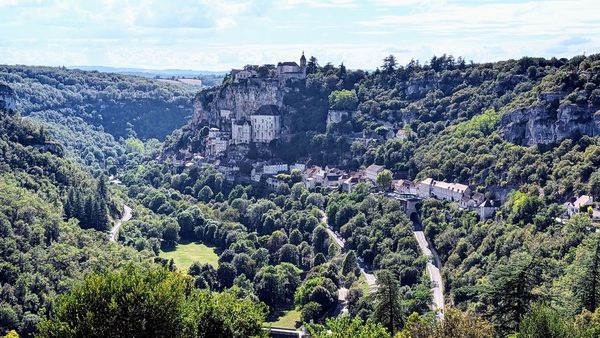 Rocamadour stacked up its cliff above a wooded valley