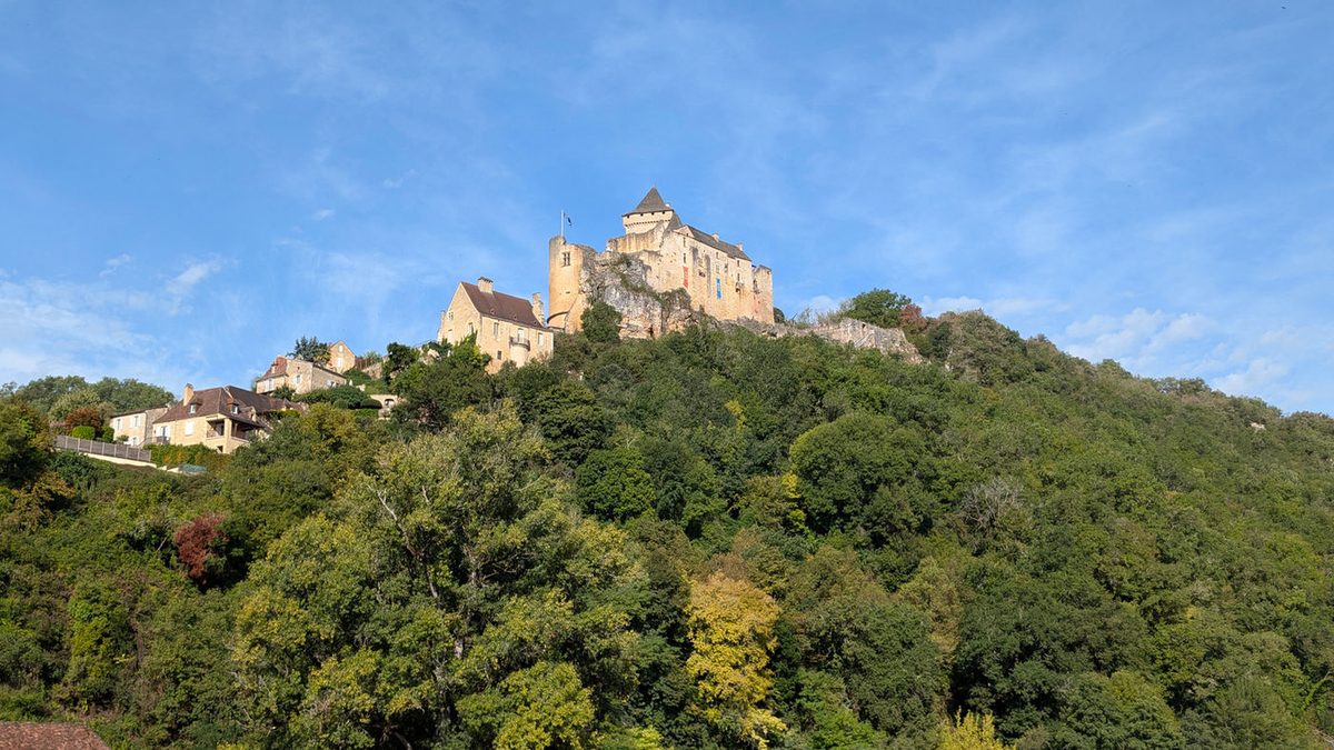 Château de Castelnaud on its wooded hill above the Dordogne valley